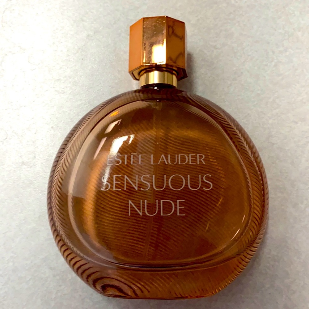 Estée Lauder SENSUOUS NUDE perfume. Nearly new only worn a handful of times.